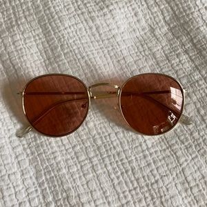 Urban Outfitters round pink glasses
